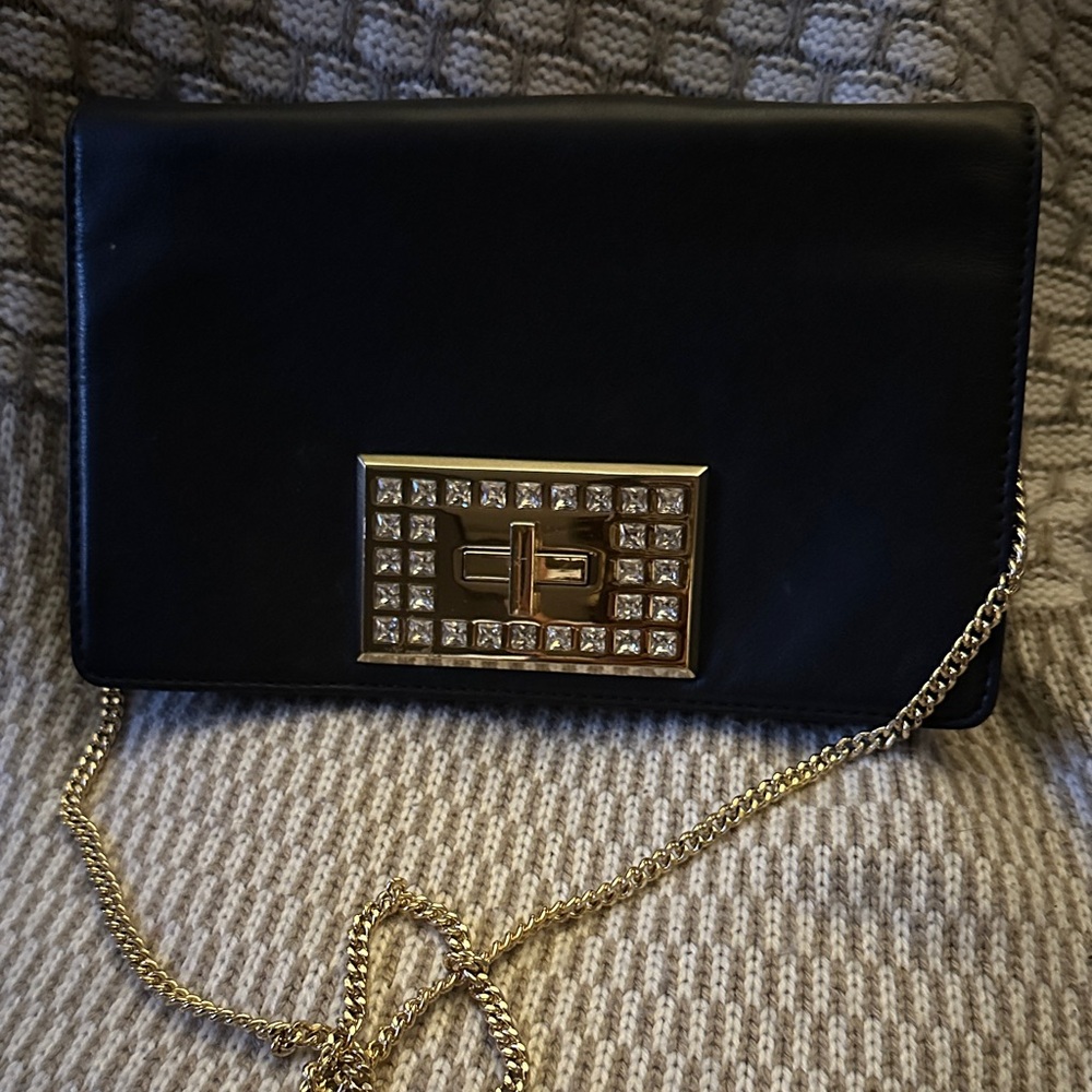 Elegant Micheal Kors Black Clutch with Gold Chain